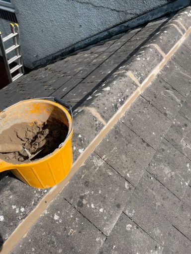 ridges being repaired on a roof