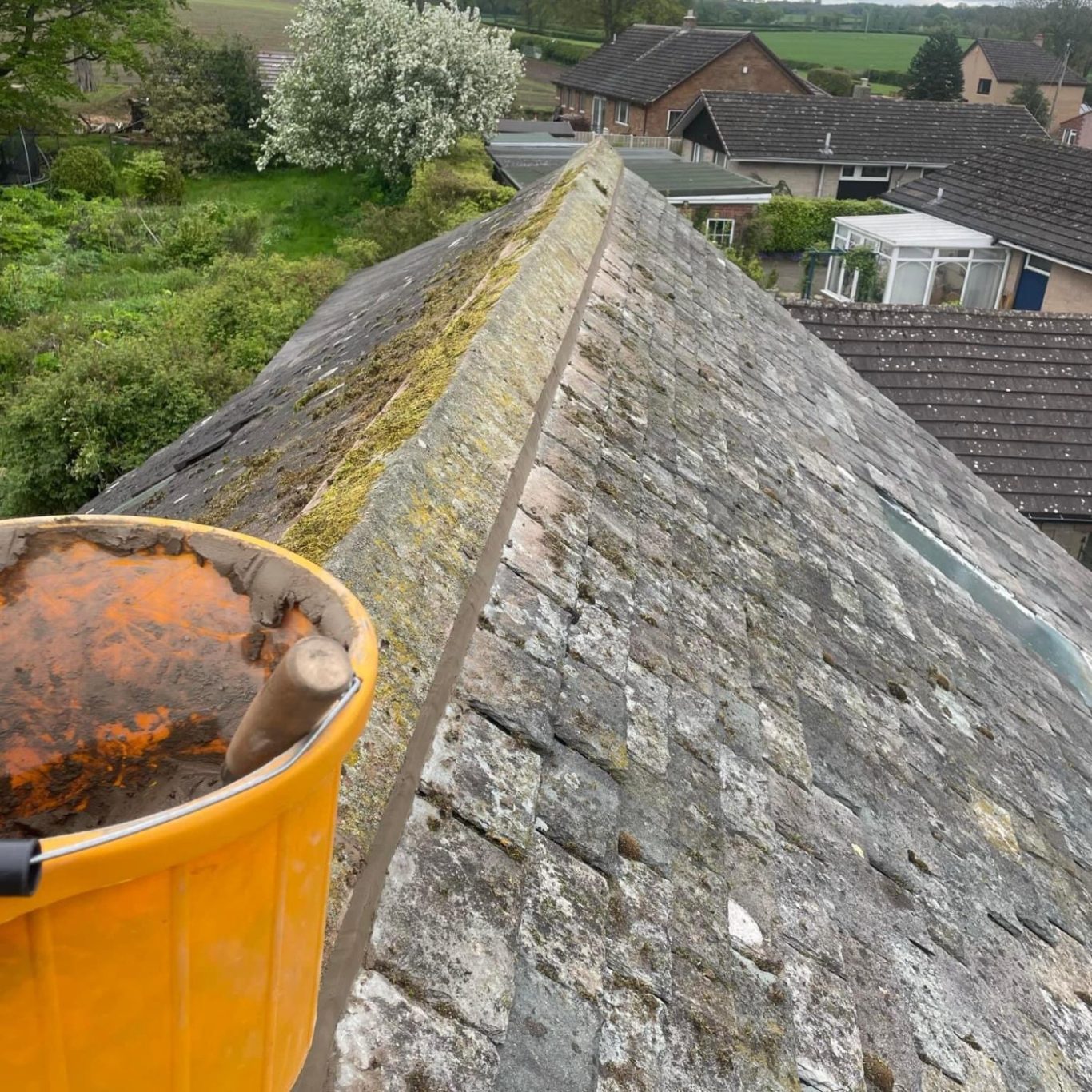 on top of a slate roof after repair work 