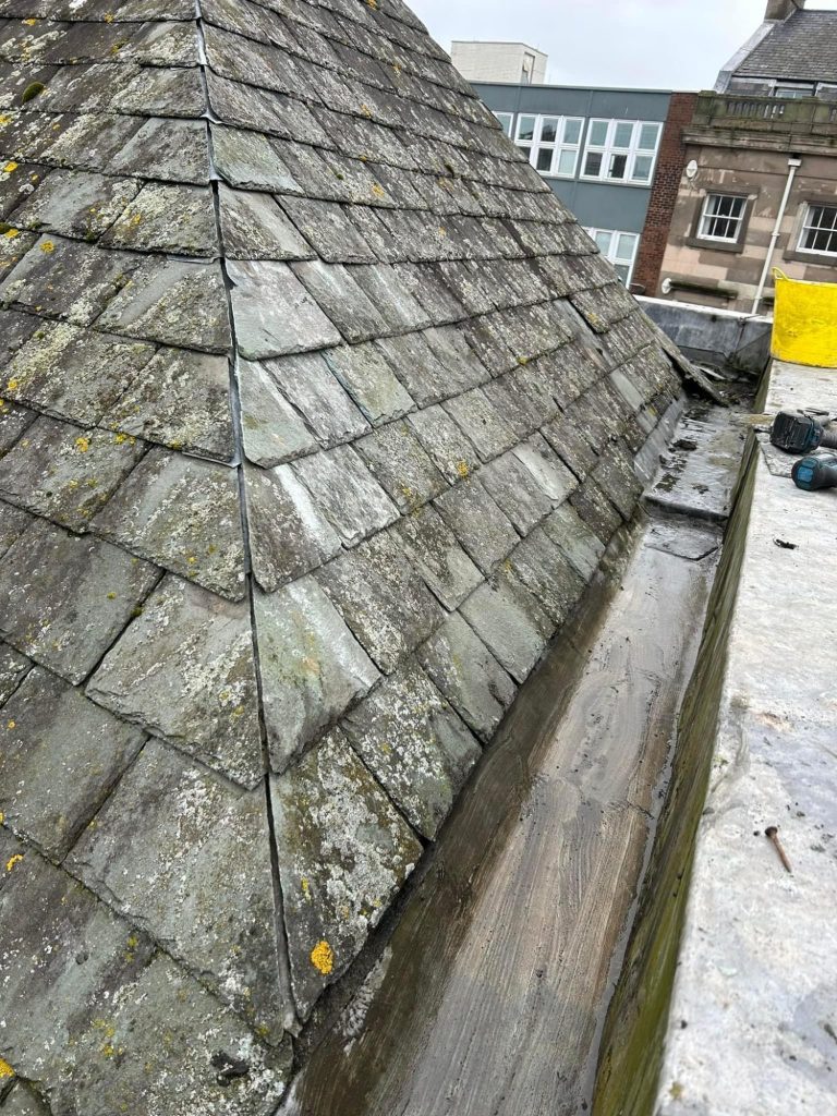 a slate roof prior to repair work