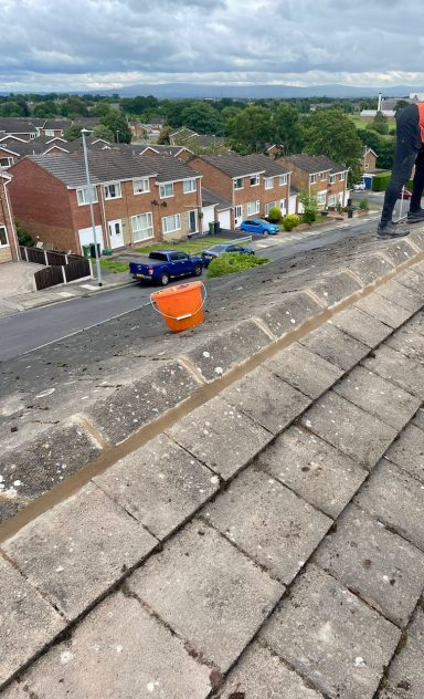 on top of a tiled roof after being fixed