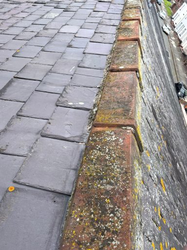 sandstone ridge tiles on a roof