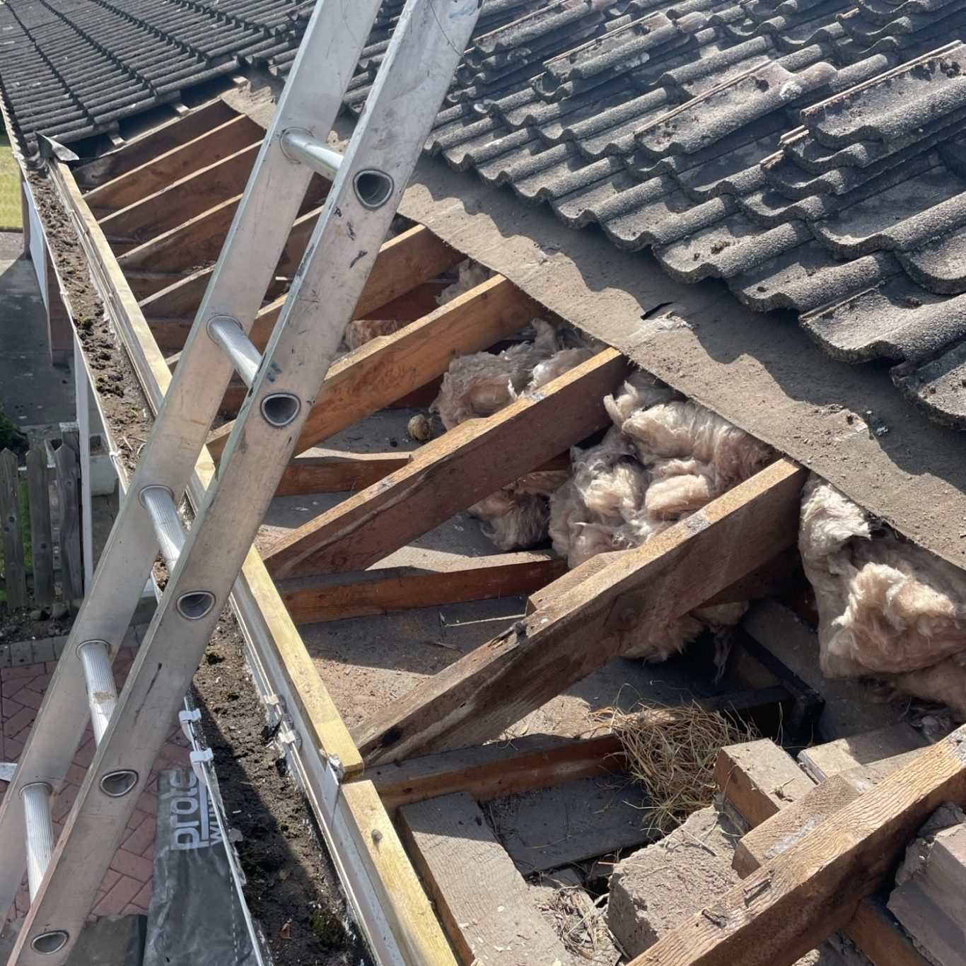 a tile roof undergoing repair work