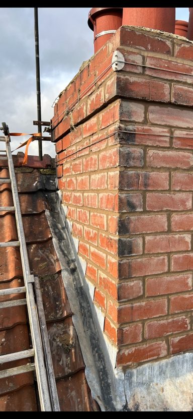 a chimney stack being fixed