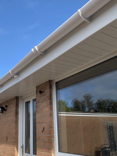 brand new guttering and facia board on a roof